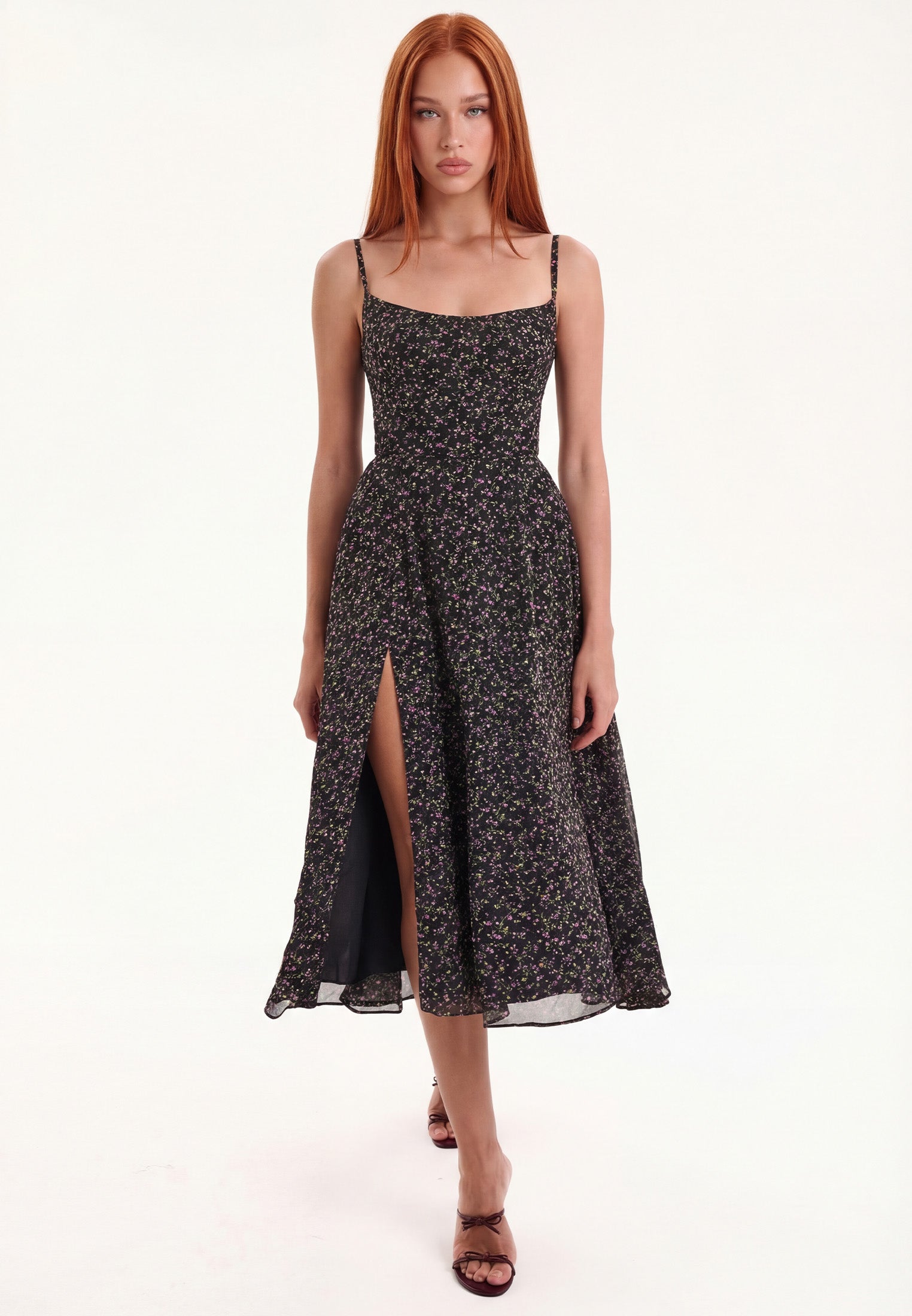 Black printed midi dress with straps and a slit skirt