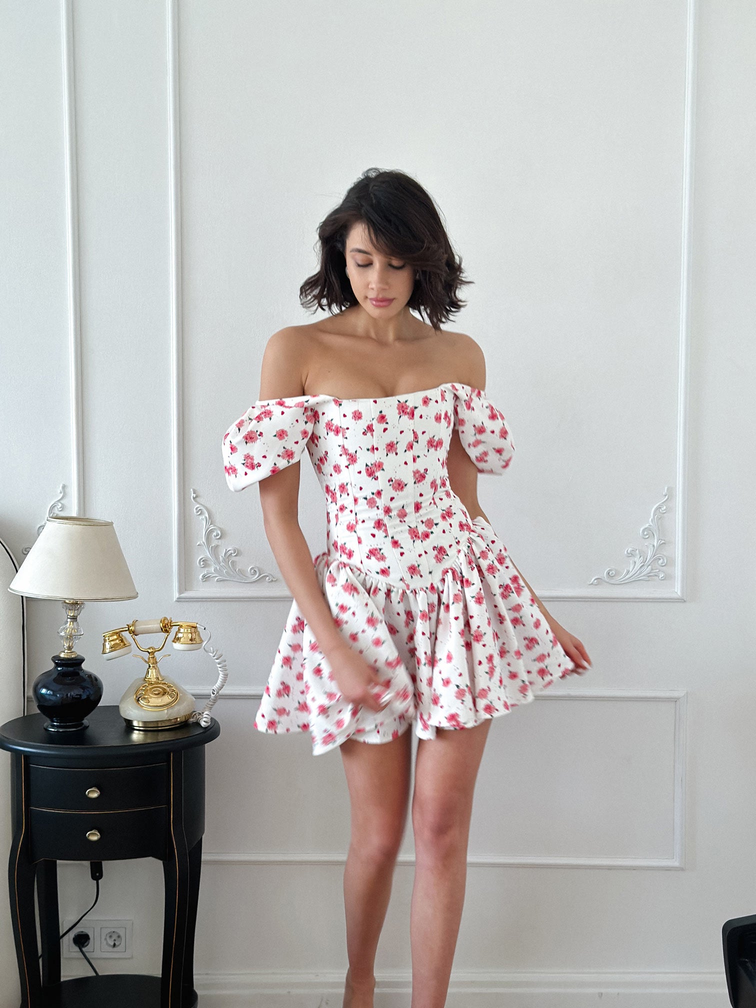 Corset-based mini dress with airy sleeves
