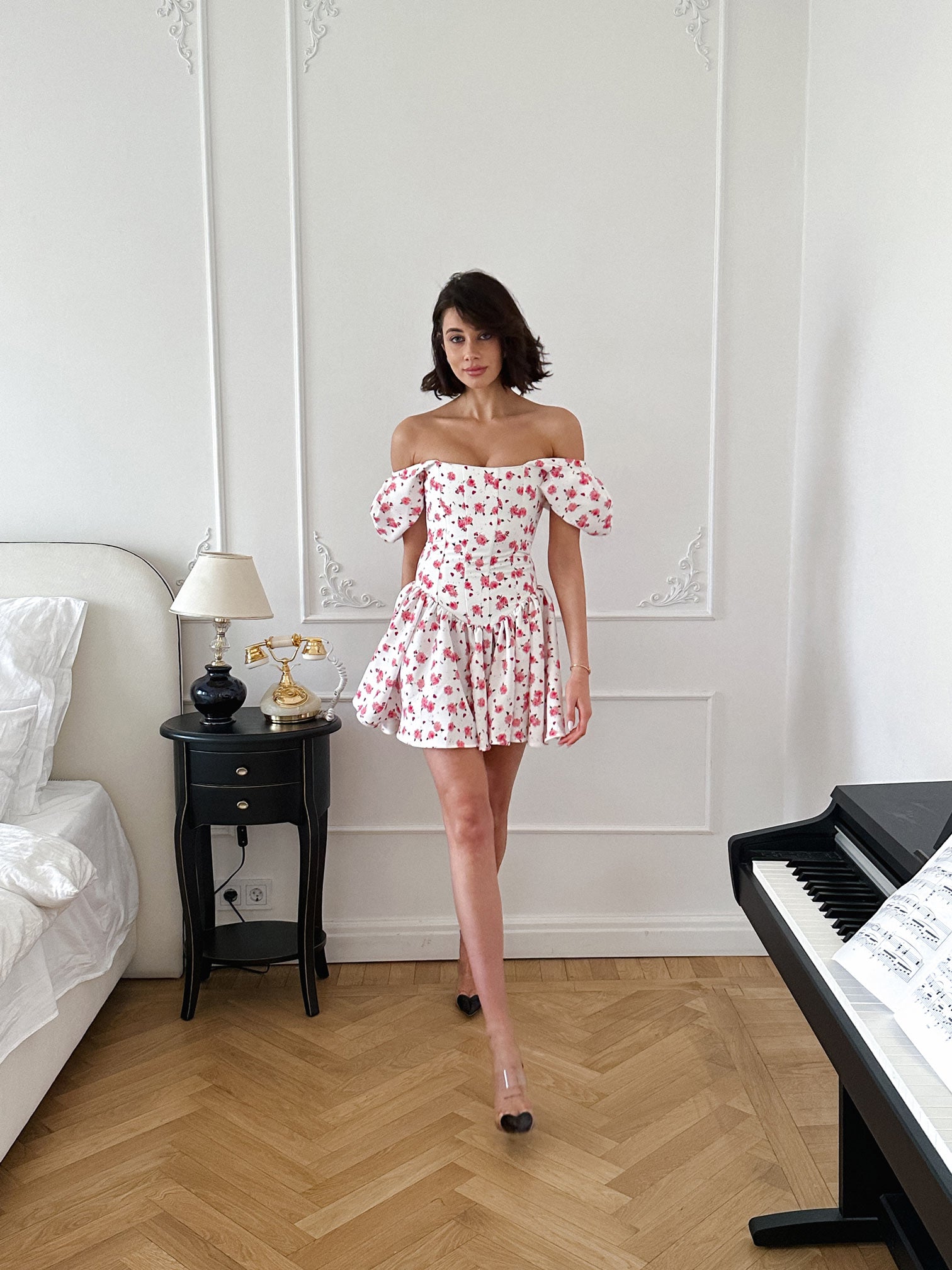 Corset-based mini dress with airy sleeves