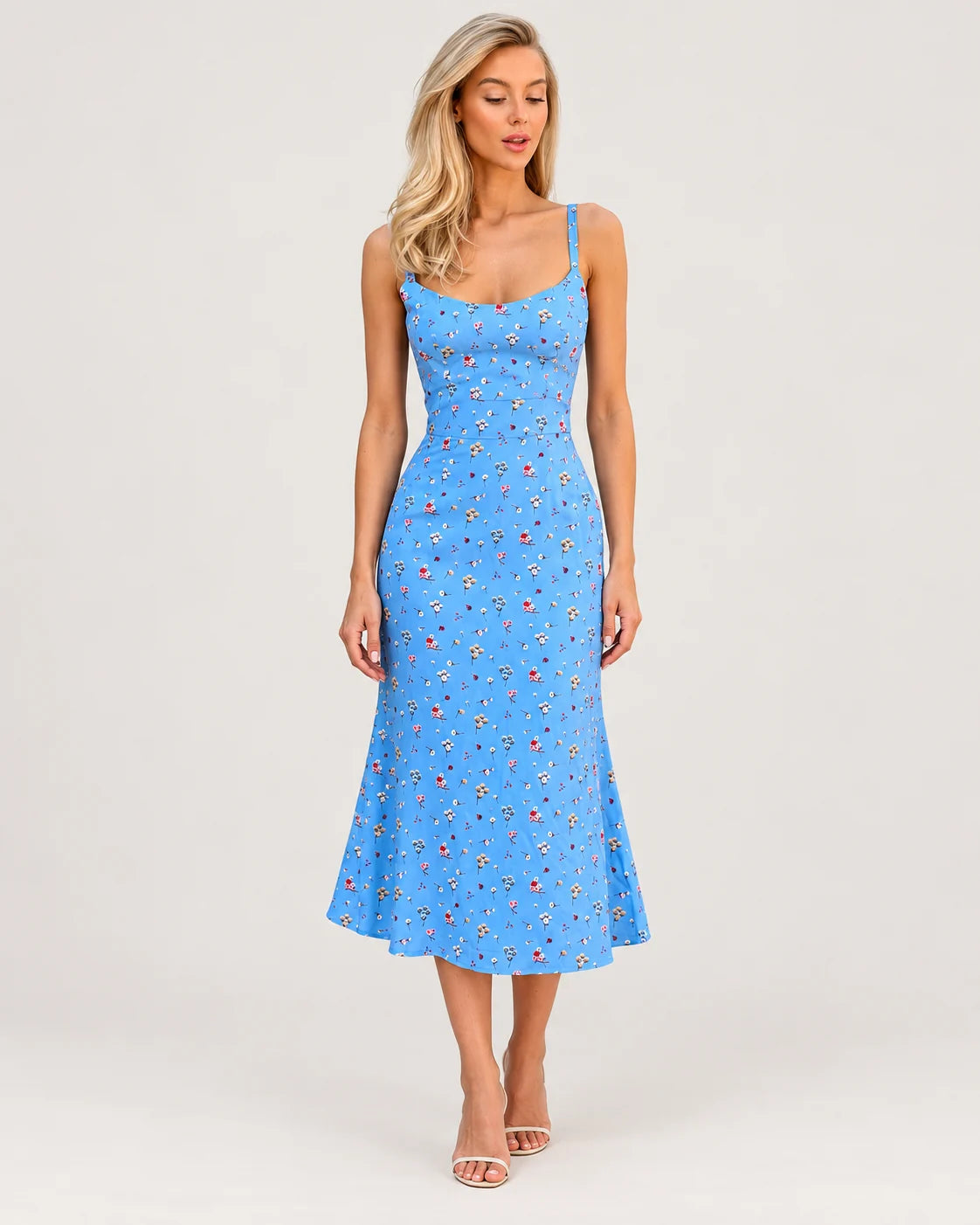Blue floral dress with straps — front view