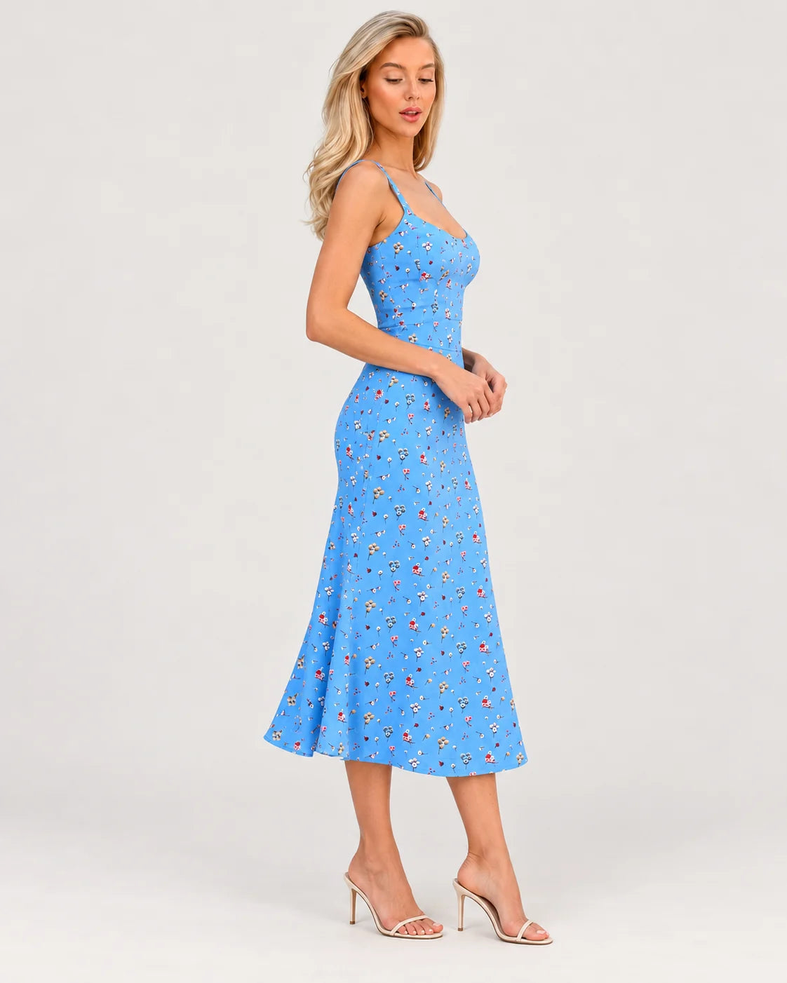 Blue floral dress with straps — side view
