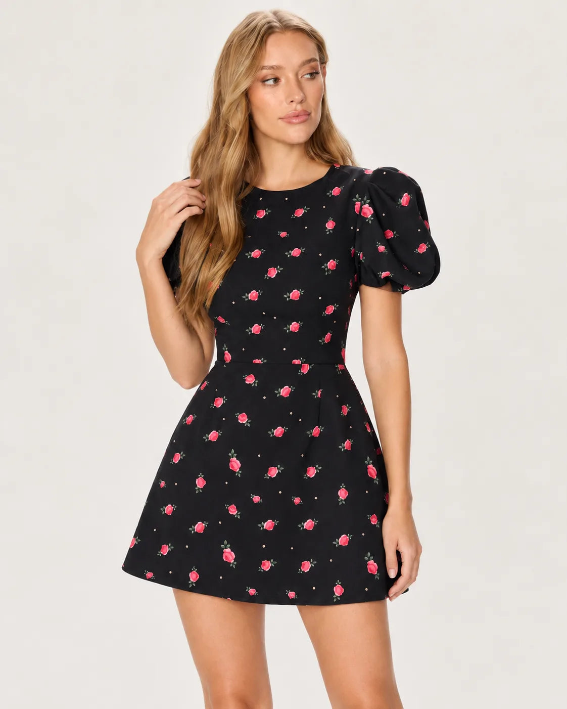 Silhouette mini with lantern sleeves — upper body view
