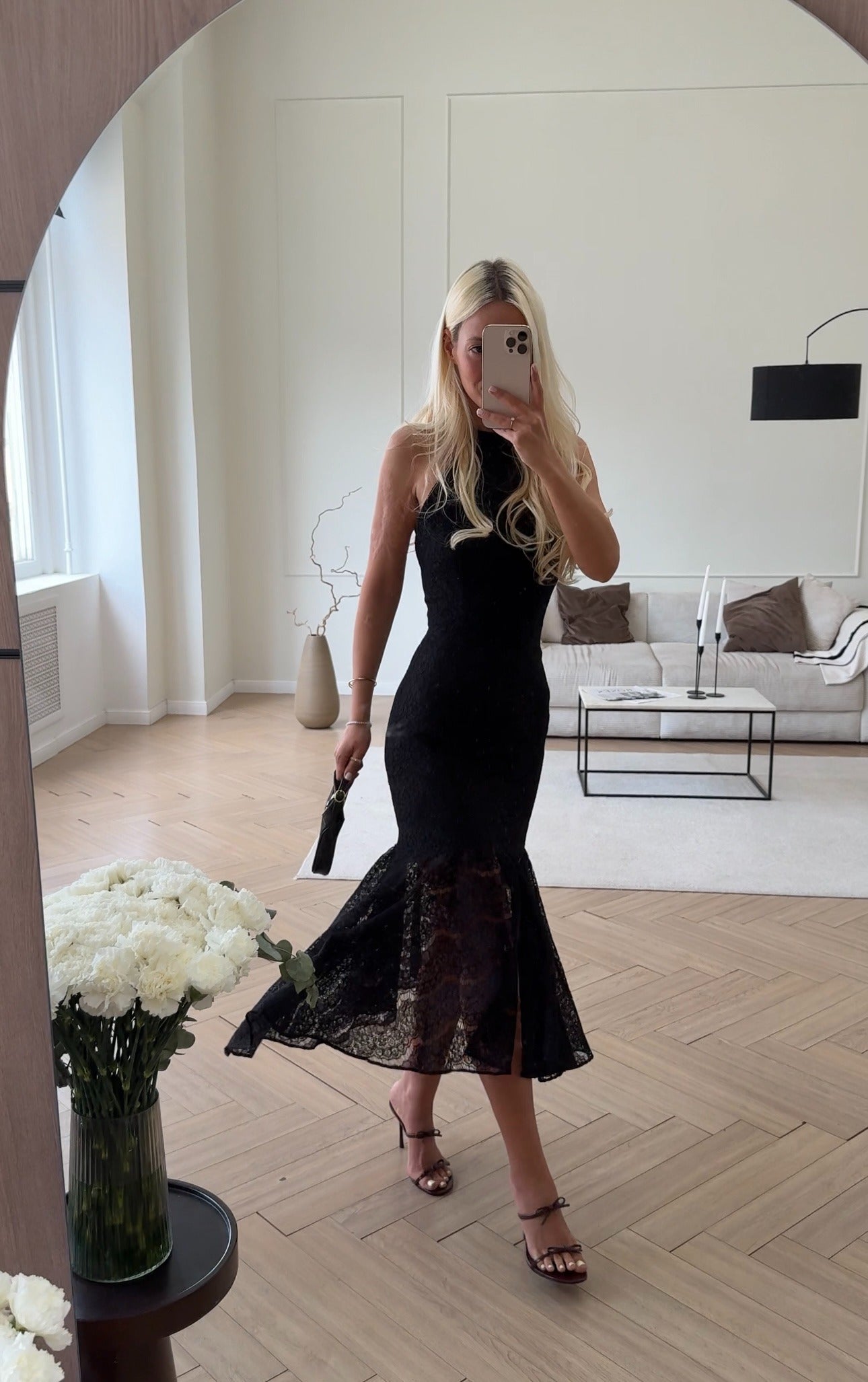 Fitted lace midi dress with an open back