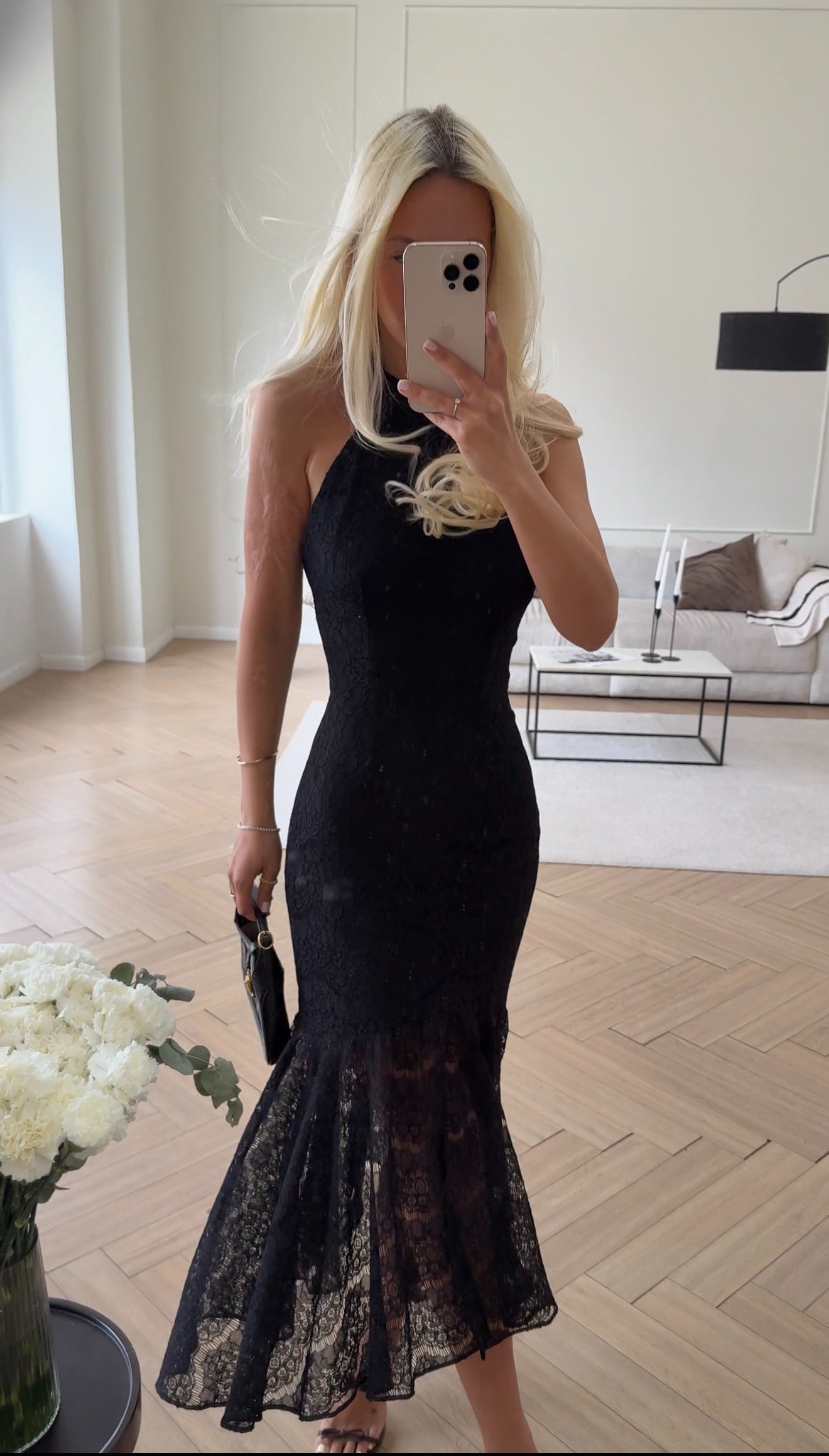 Fitted lace midi dress with an open back