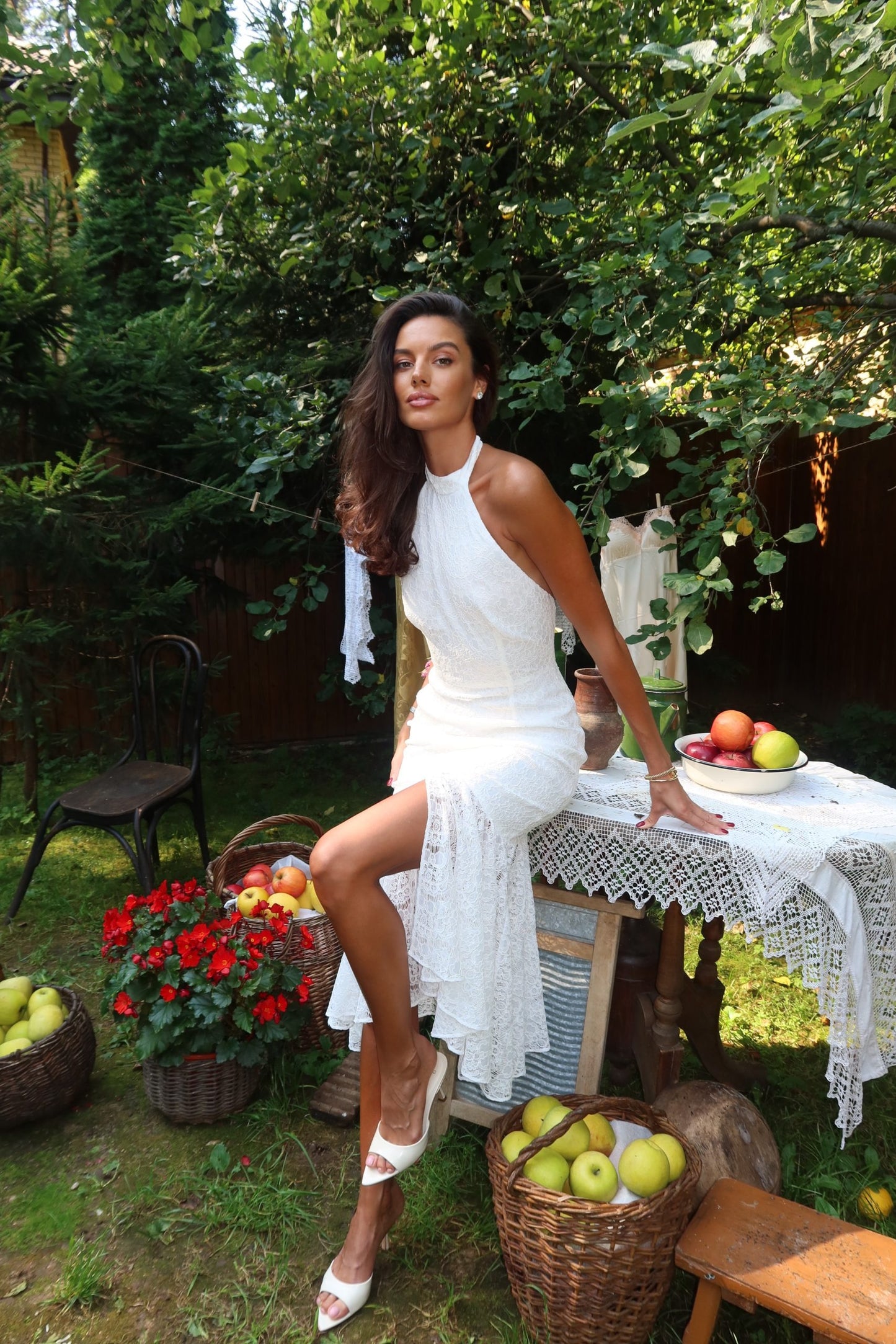 Fitted lace midi dress with an open back