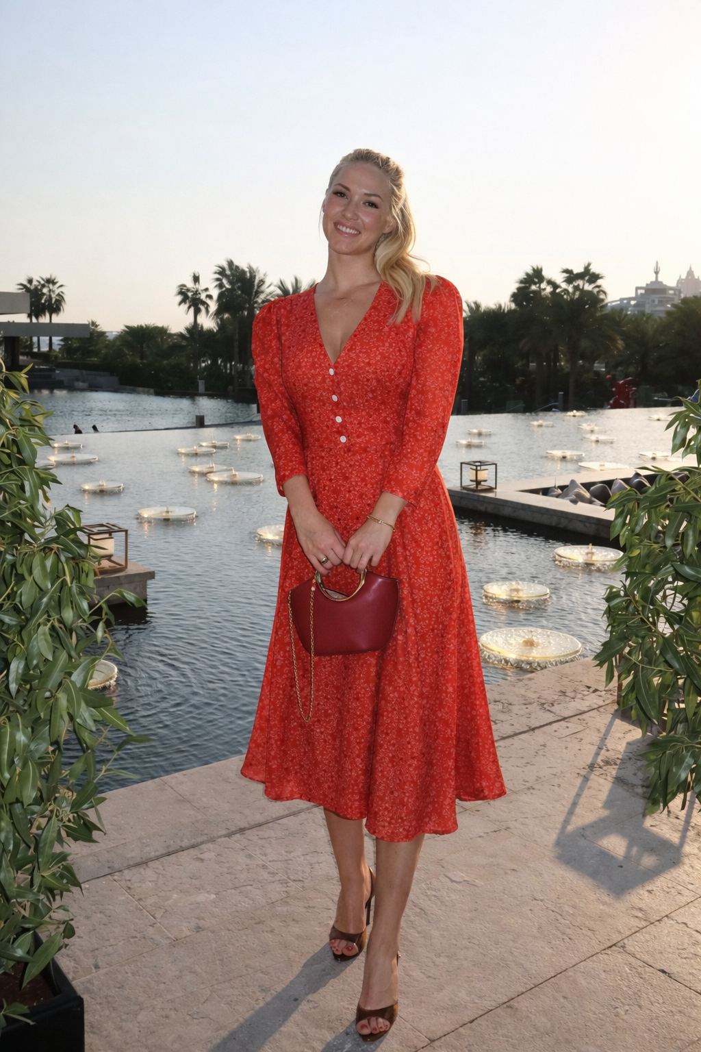 Midi dress with V neckline and pleated skirt