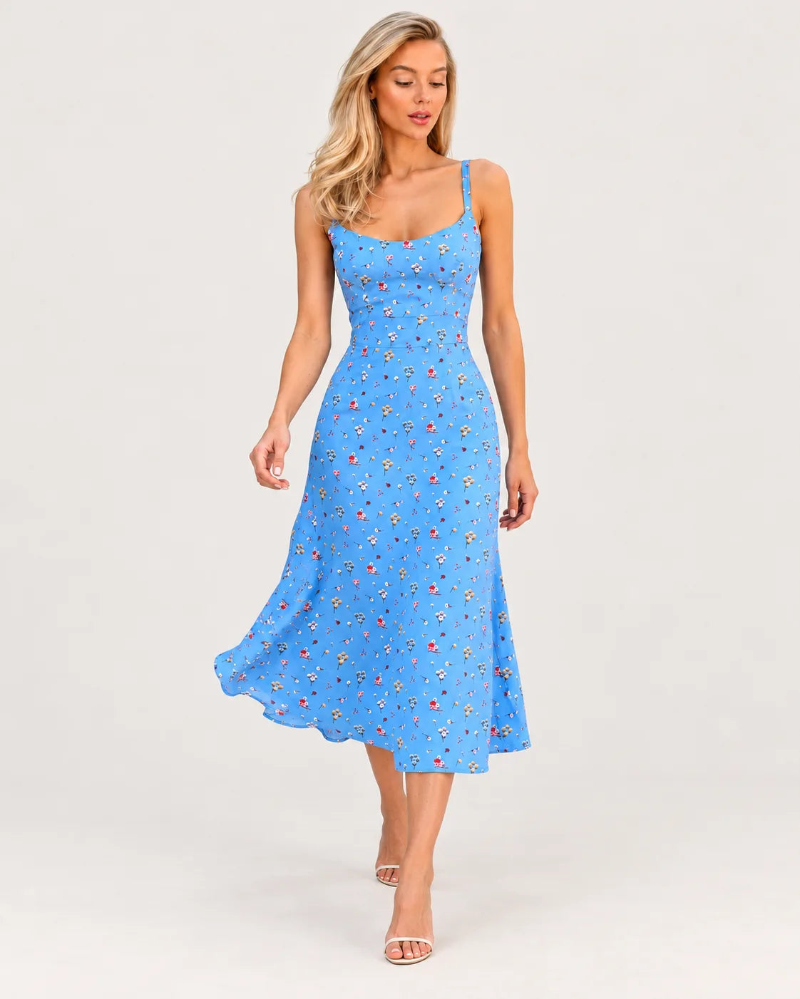 Blue floral dress with straps — walking