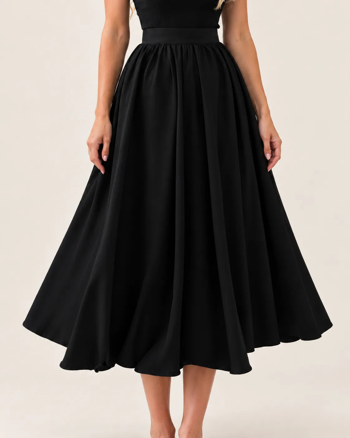 Puffy midi skirt in black — fabric and detail close-up