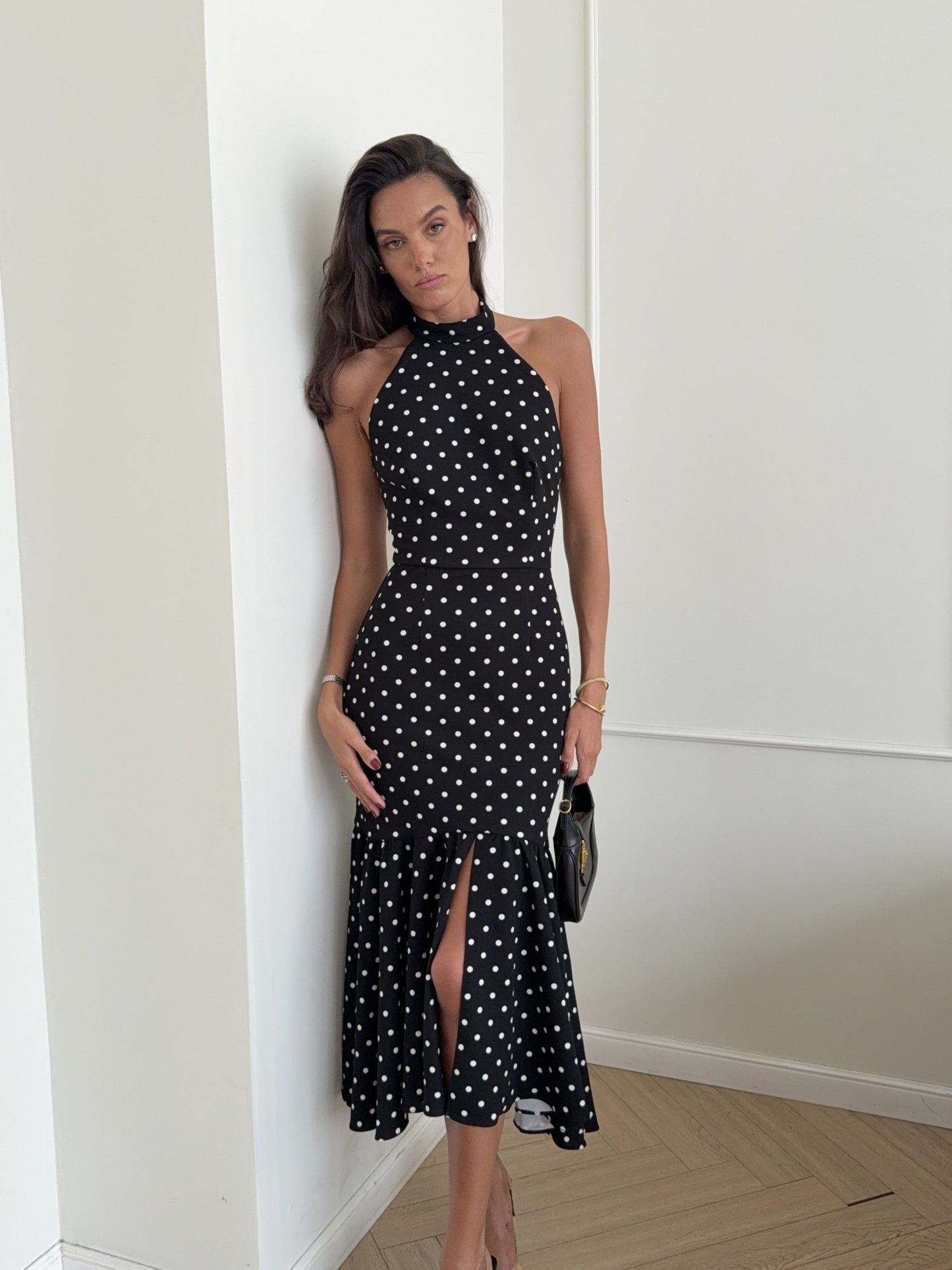 Fitted midi dress with an open back