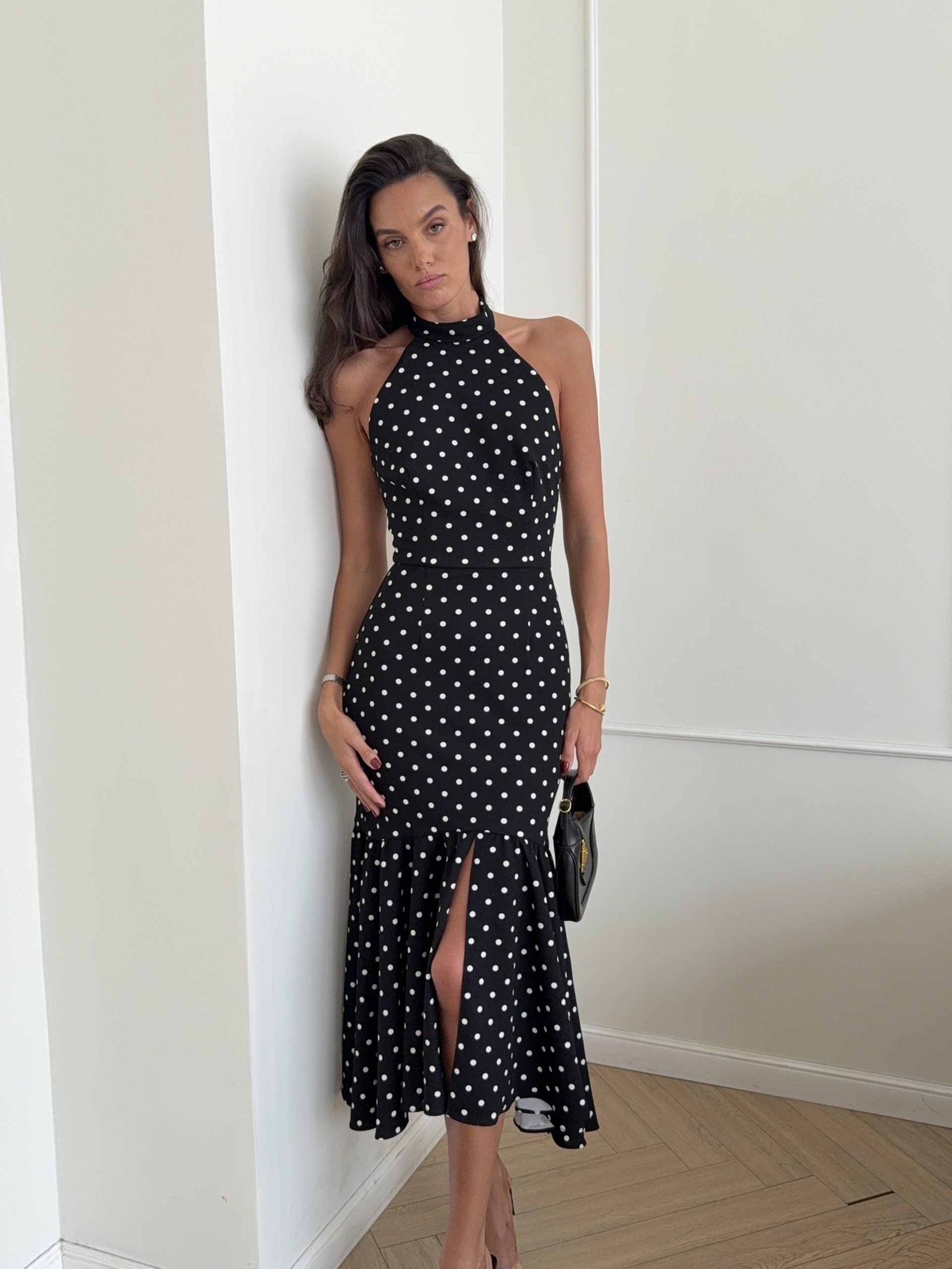 Fitted midi dress with an open back