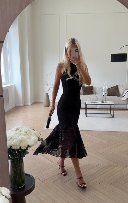Fitted lace midi dress with an open back