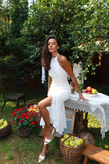 Fitted lace midi dress with an open back